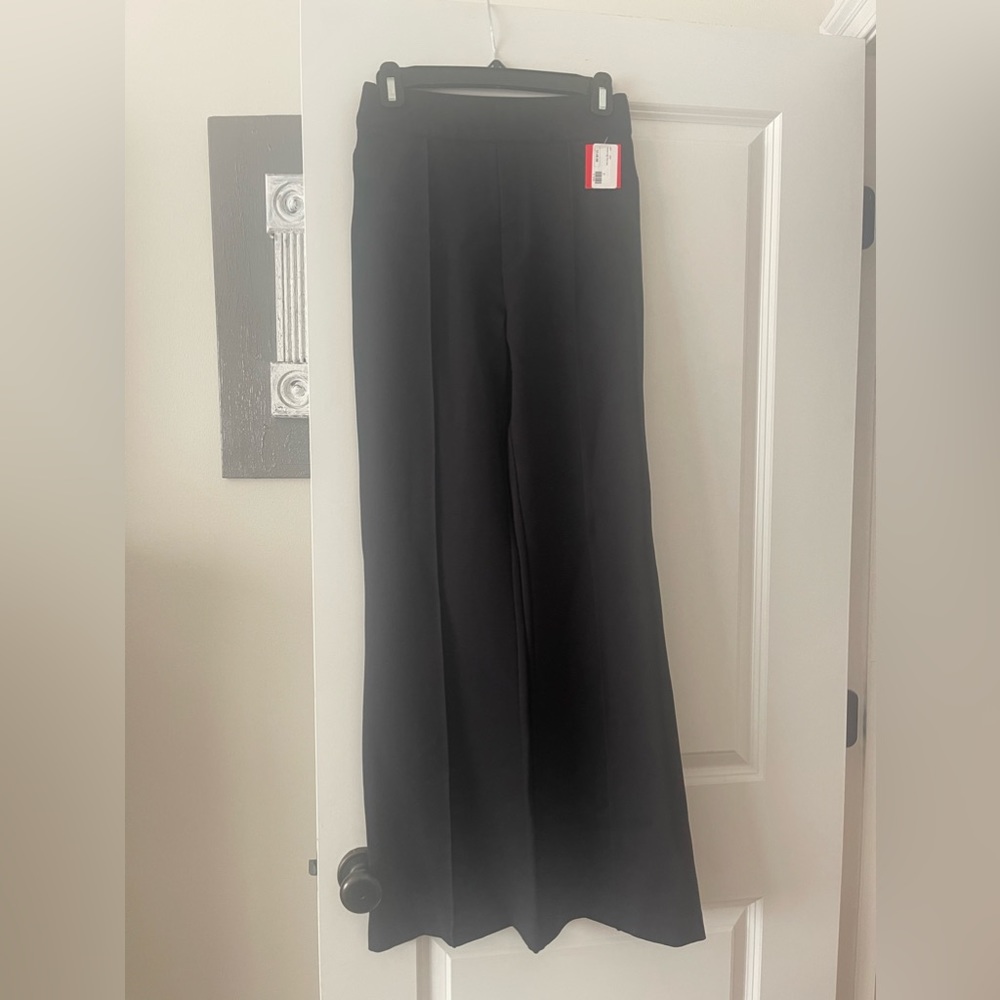 New with tags size small spanx perfect high rise flare in black.
